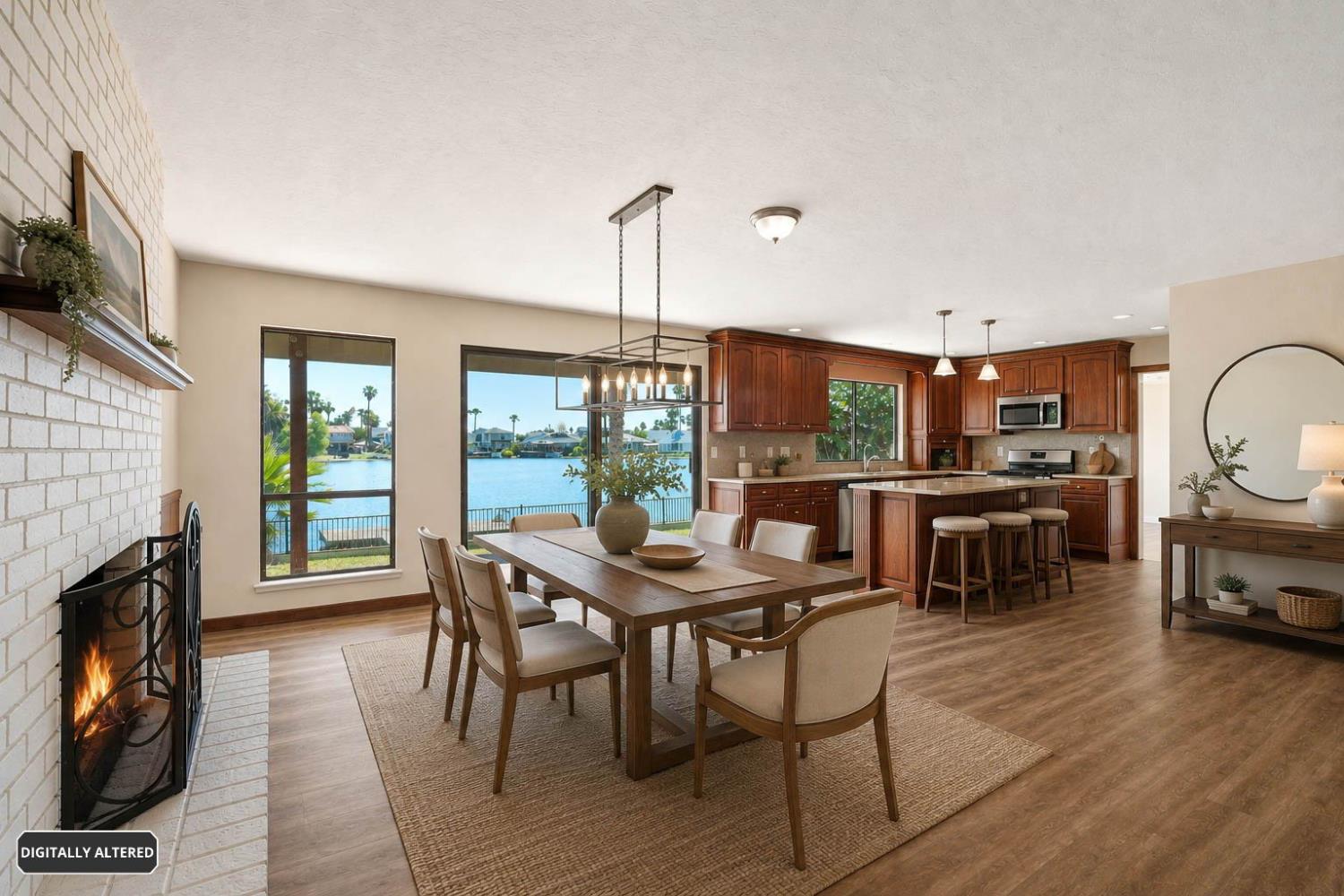 5501 Riverlake Road Discovery Bay, CA 94505 - Photo 19 of 60 a dining room with furniture and wooden floor