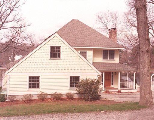 7 Riverview Road Westport, CT 06880 - Photo 1 of 1 a front view of a house with yard