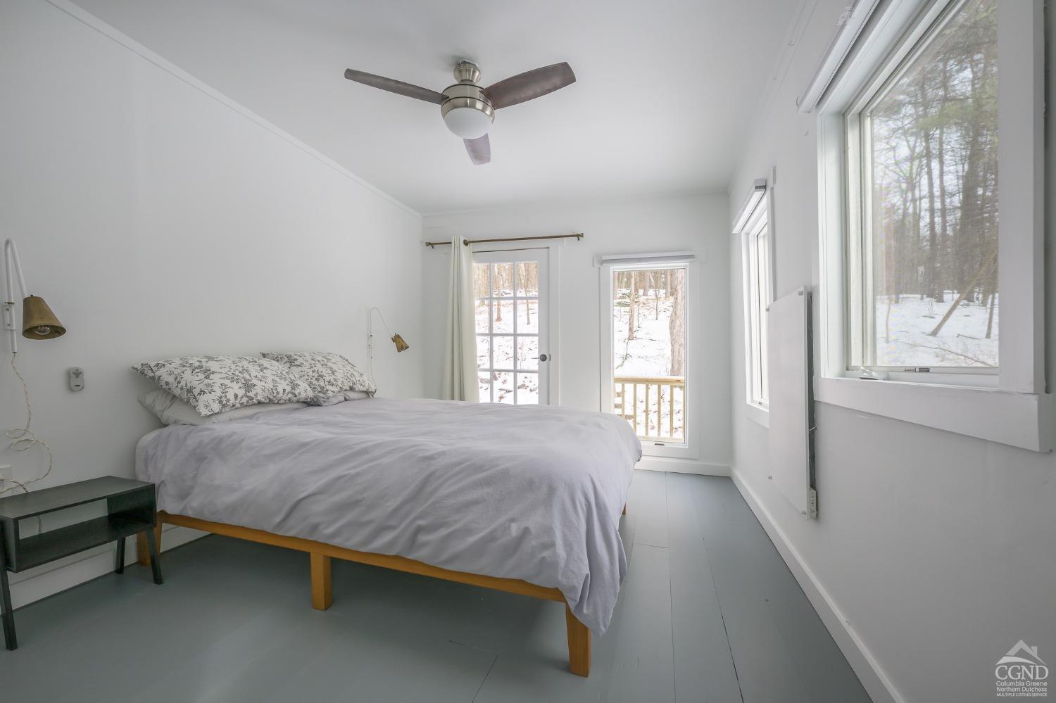 203 Stone Jug Road Craryville, NY 12521 - Photo 15 of 29 a bed sitting in a spacious bedroom next to a window