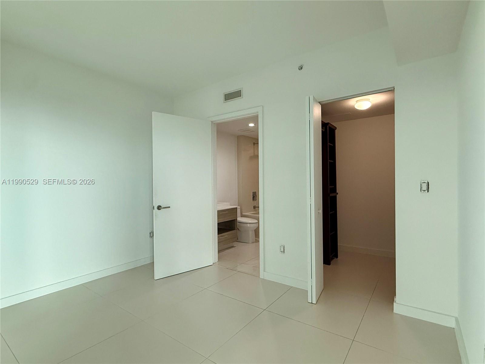 1300 South Miami Avenue, Unit 2008 Miami, FL 33130 - Photo 20 of 29 a view of an empty room and a bathroom