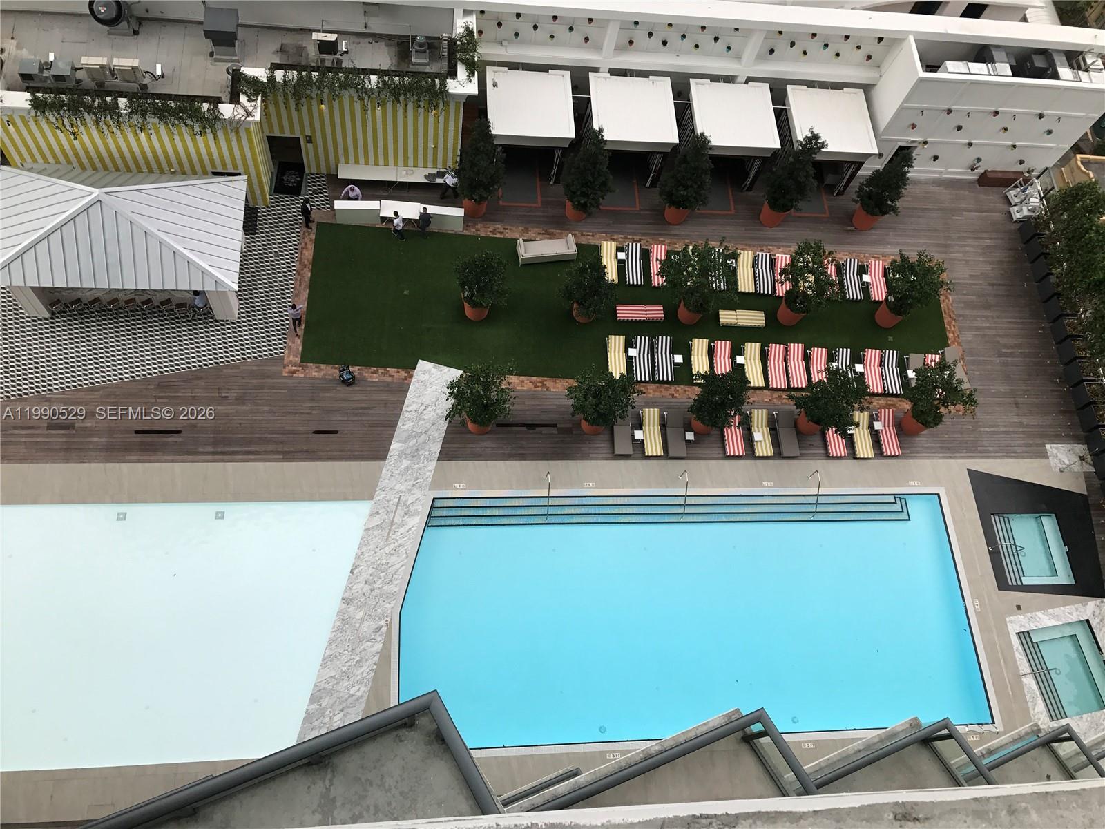 1300 South Miami Avenue, Unit 2008 Miami, FL 33130 - Photo 26 of 29 a view of swimming pool with outdoor seating