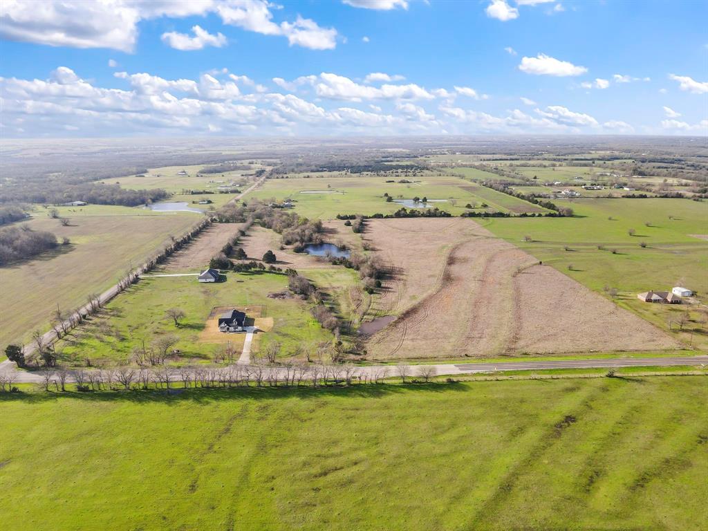 669 County Road 669 Blue Ridge, TX 75424 - Photo 1 of 1 a view of a lake with a big yard