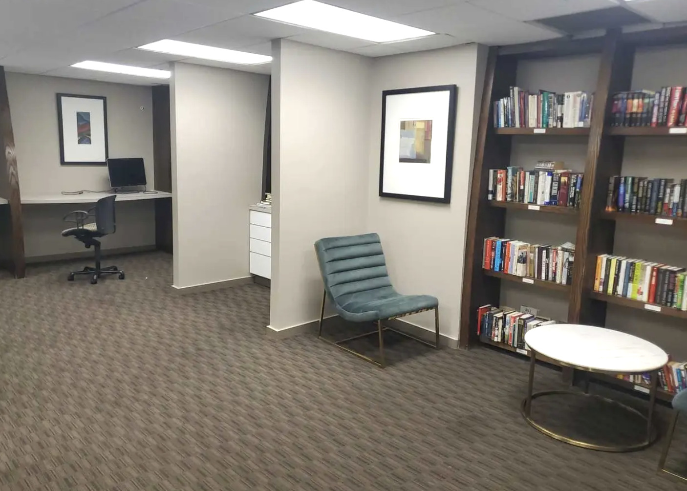 5320 North Sheridan Road, Unit 2110 Chicago, IL 60640 - Photo 11 of 16 a view of a livingroom with furniture and a bookshelf
