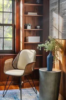 a outdoor living space with furniture and a potted plant