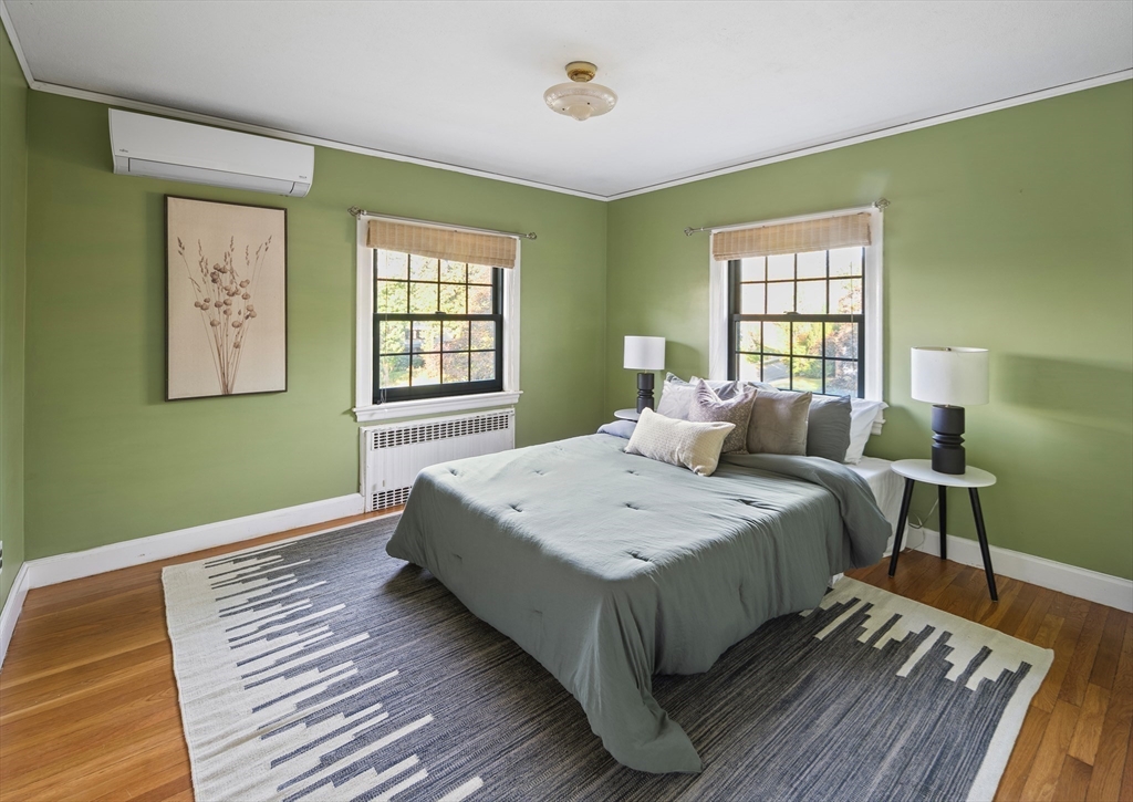 263 Common Street Belmont, MA 02478 - Photo 20 of 31 a bedroom with a bed and a window