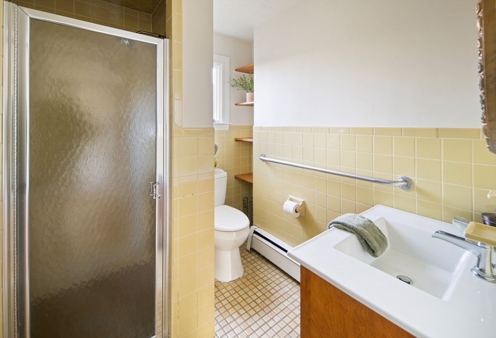 263 Common Street Belmont, MA 02478 - Photo 26 of 31 a bathroom with a sink and a mirror