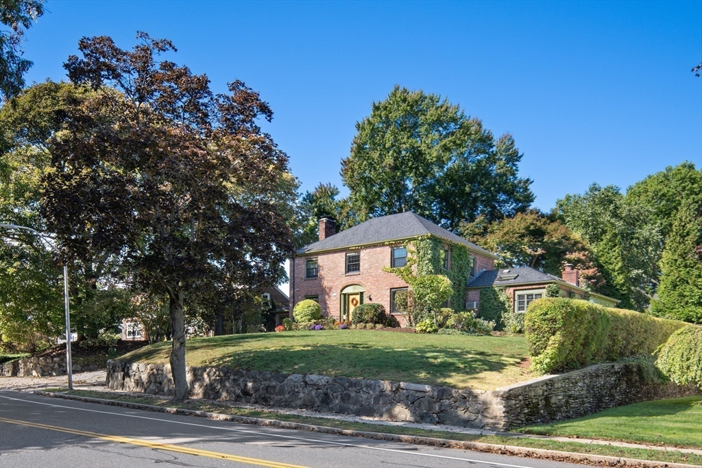 263 Common Street Belmont, MA 02478 - Photo 31 of 31 a front view of a house with a yard