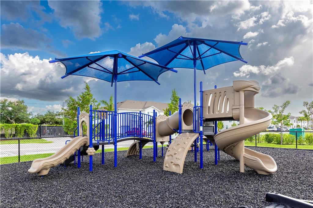 15307 Wildflower Circle Naples, FL 34119 - Photo 23 of 26 a view of a park with slide