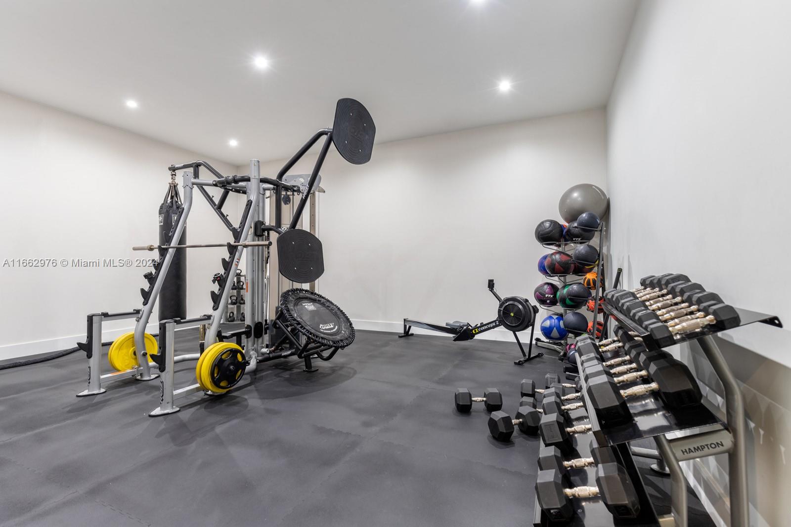 801 Brickell Key Boulevard, Unit 2008 Miami, FL 33131 - Photo 14 of 19 a view of a room with gym equipment