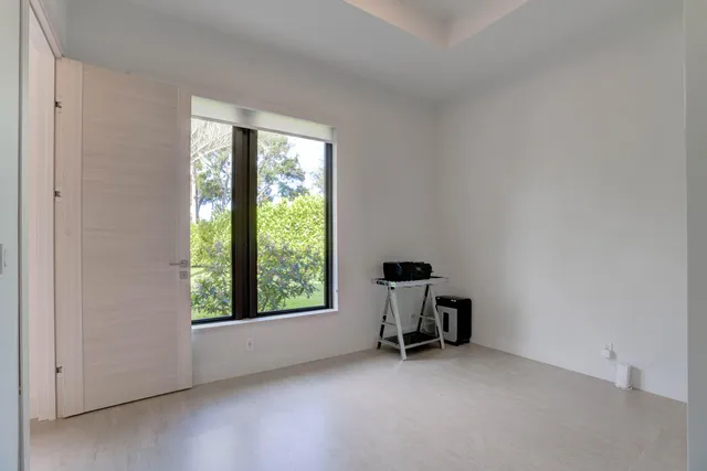 an empty room with windows