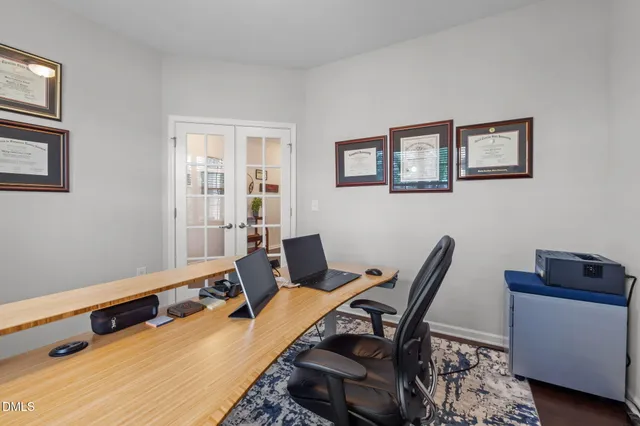 a workspace with furniture and window