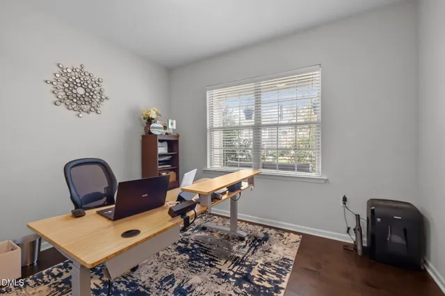 a bedroom with a bed and ceiling fan