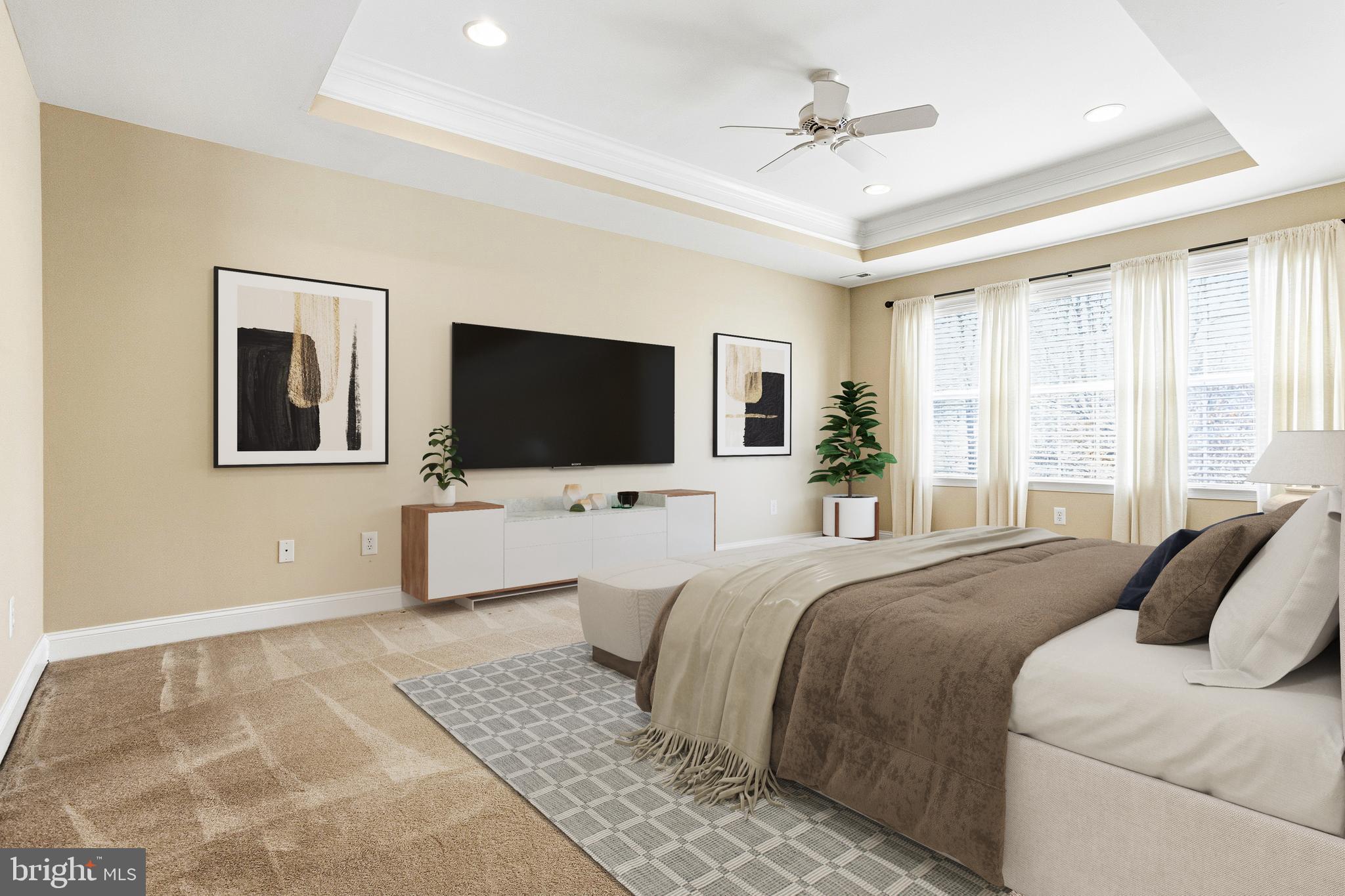 99 Longview Lane Newtown Square, PA 19073 - Photo 12 of 50 a bedroom with a bed flat screen tv and a window