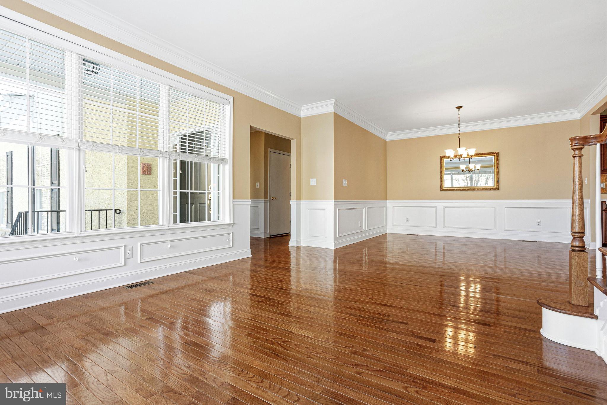 99 Longview Lane Newtown Square, PA 19073 - Photo 14 of 50 a view of an empty room with wooden floor and a window
