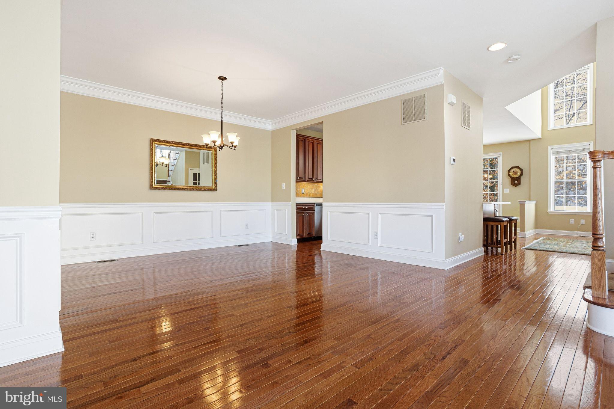 99 Longview Lane Newtown Square, PA 19073 - Photo 18 of 50 a view of empty room with wooden floor and windows
