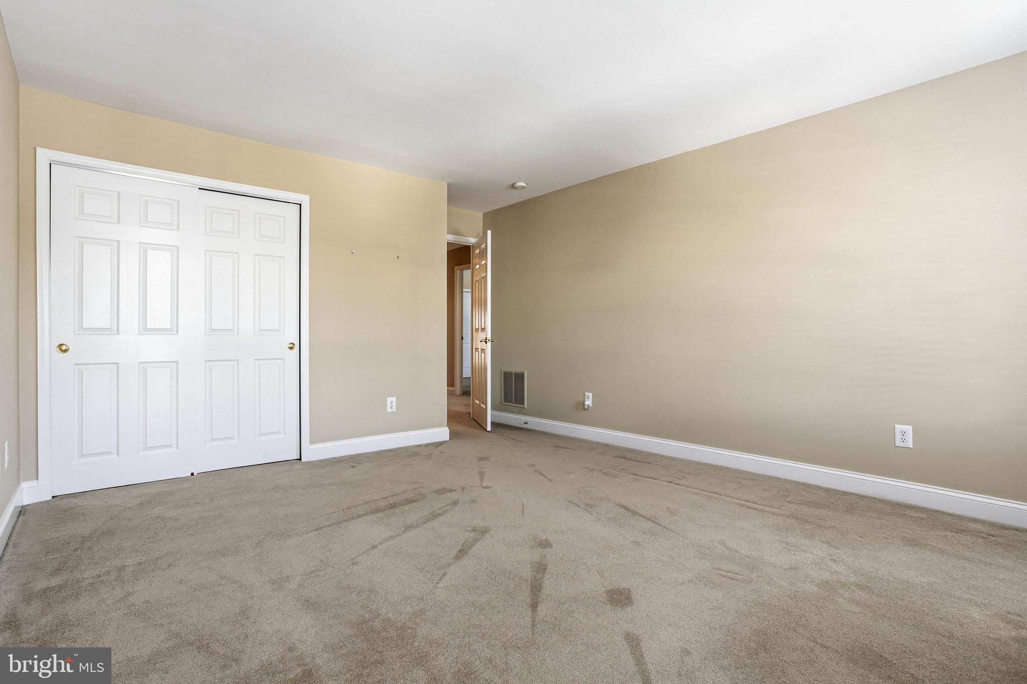 99 Longview Lane Newtown Square, PA 19073 - Photo 28 of 50 an empty room with windows