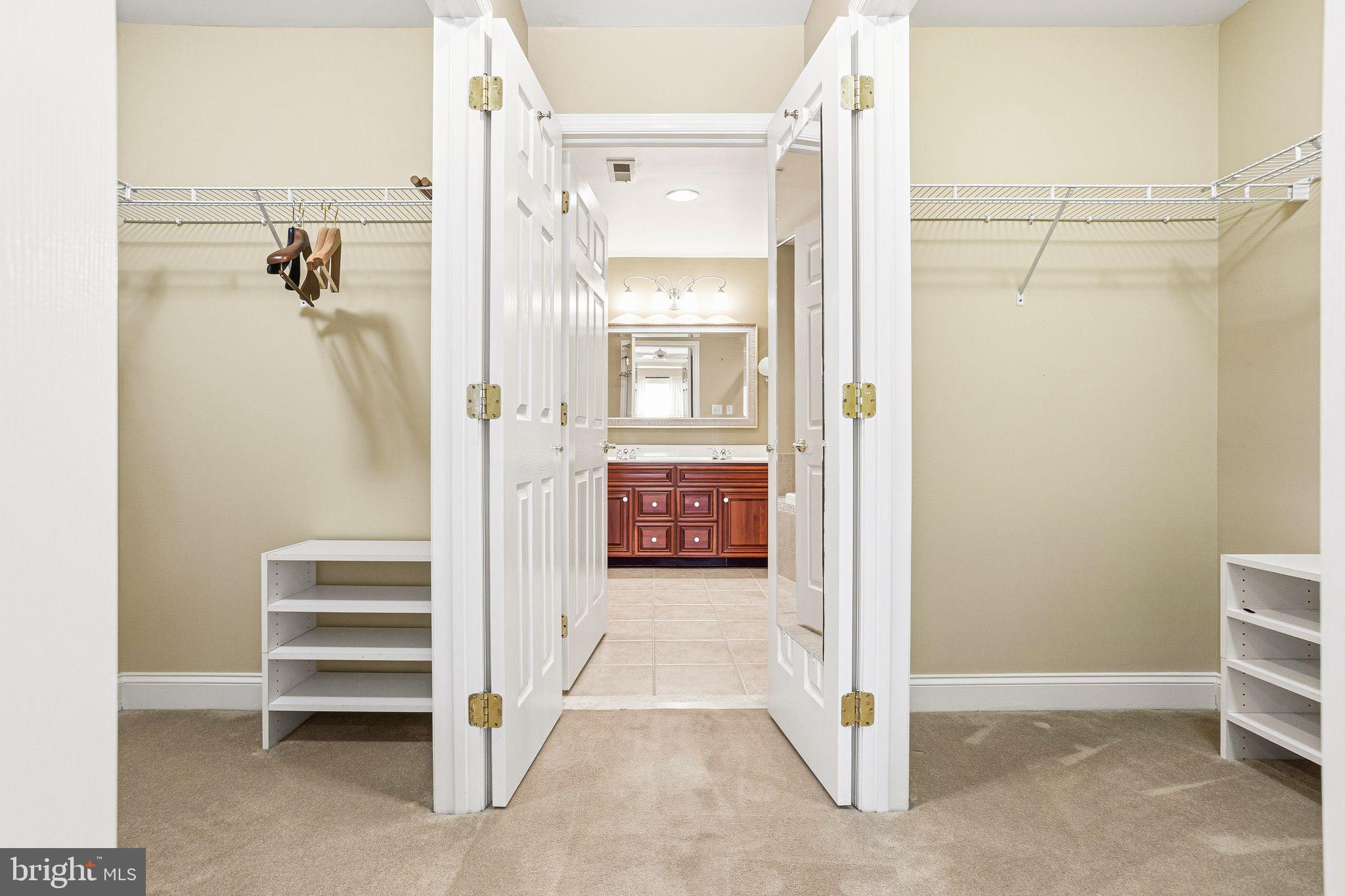 99 Longview Lane Newtown Square, PA 19073 - Photo 35 of 50 a view of a walk in closet and bedroom