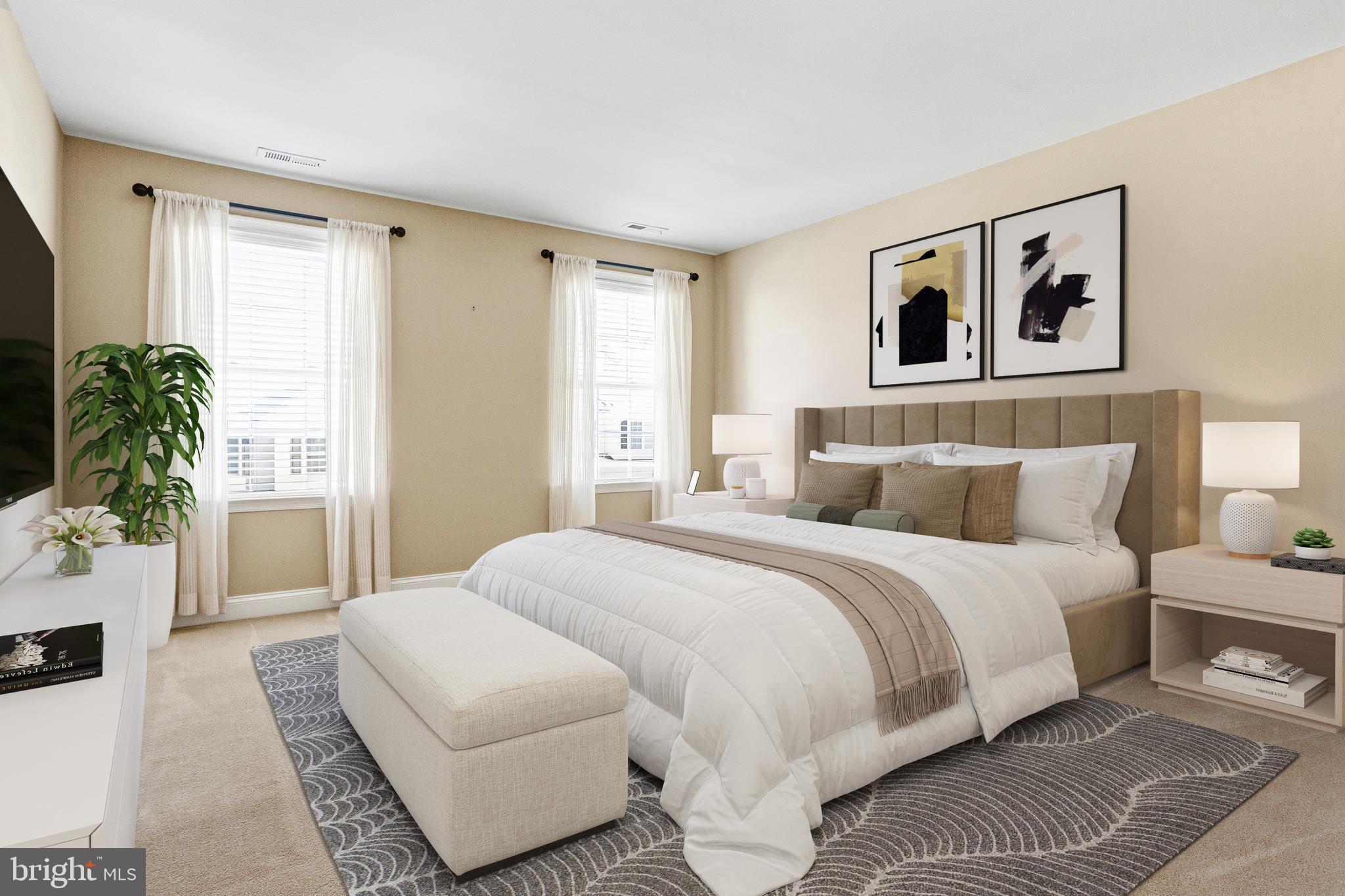 99 Longview Lane Newtown Square, PA 19073 - Photo 4 of 50 a spacious bedroom with a large bed and a couch