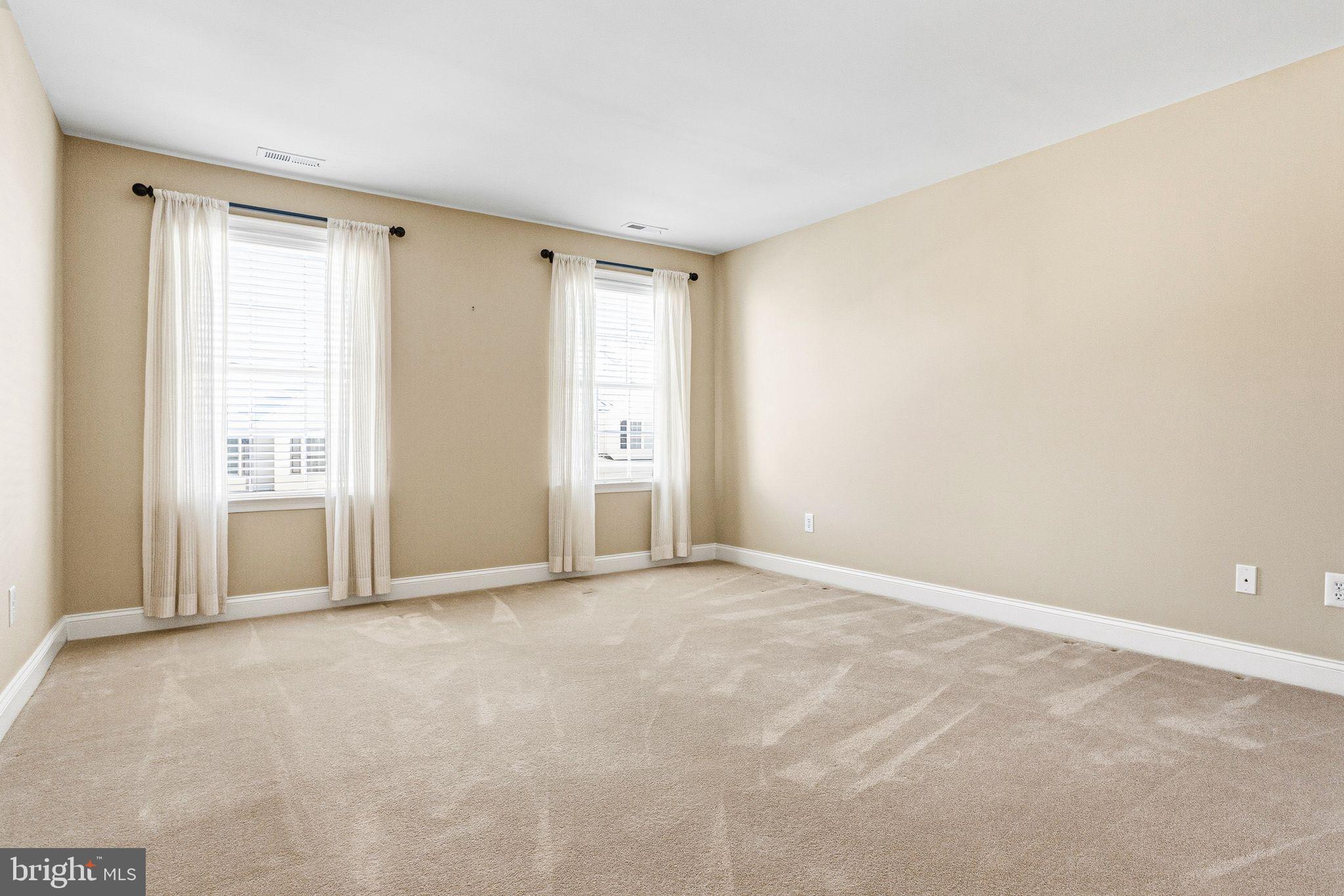 99 Longview Lane Newtown Square, PA 19073 - Photo 42 of 50 a view of an empty room with a window