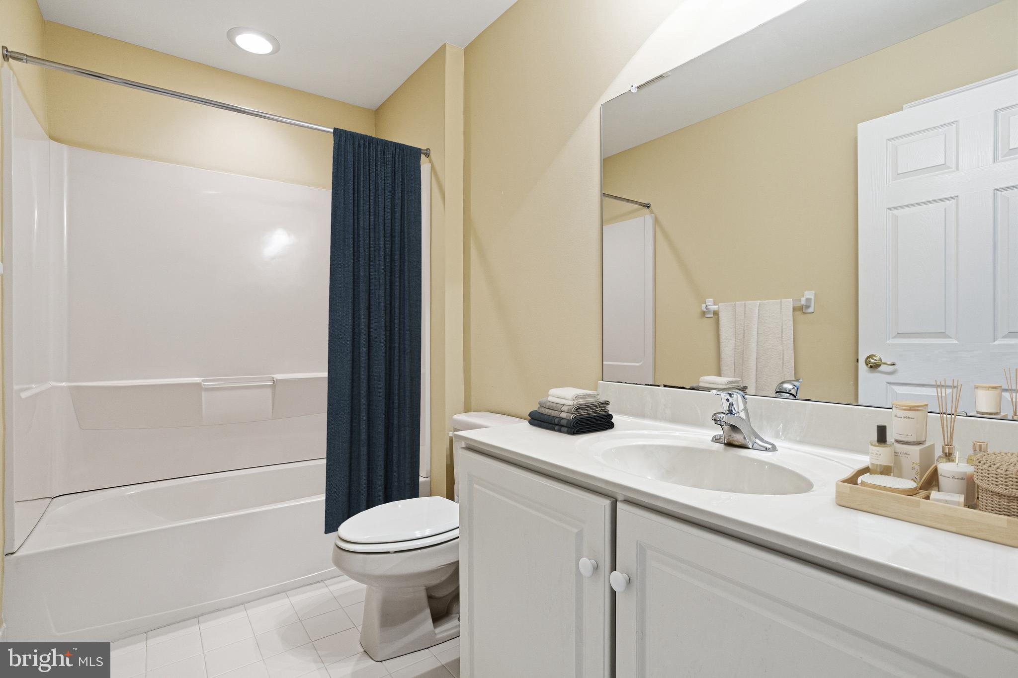 99 Longview Lane Newtown Square, PA 19073 - Photo 50 of 50 a bathroom with a sink a toilet and shower