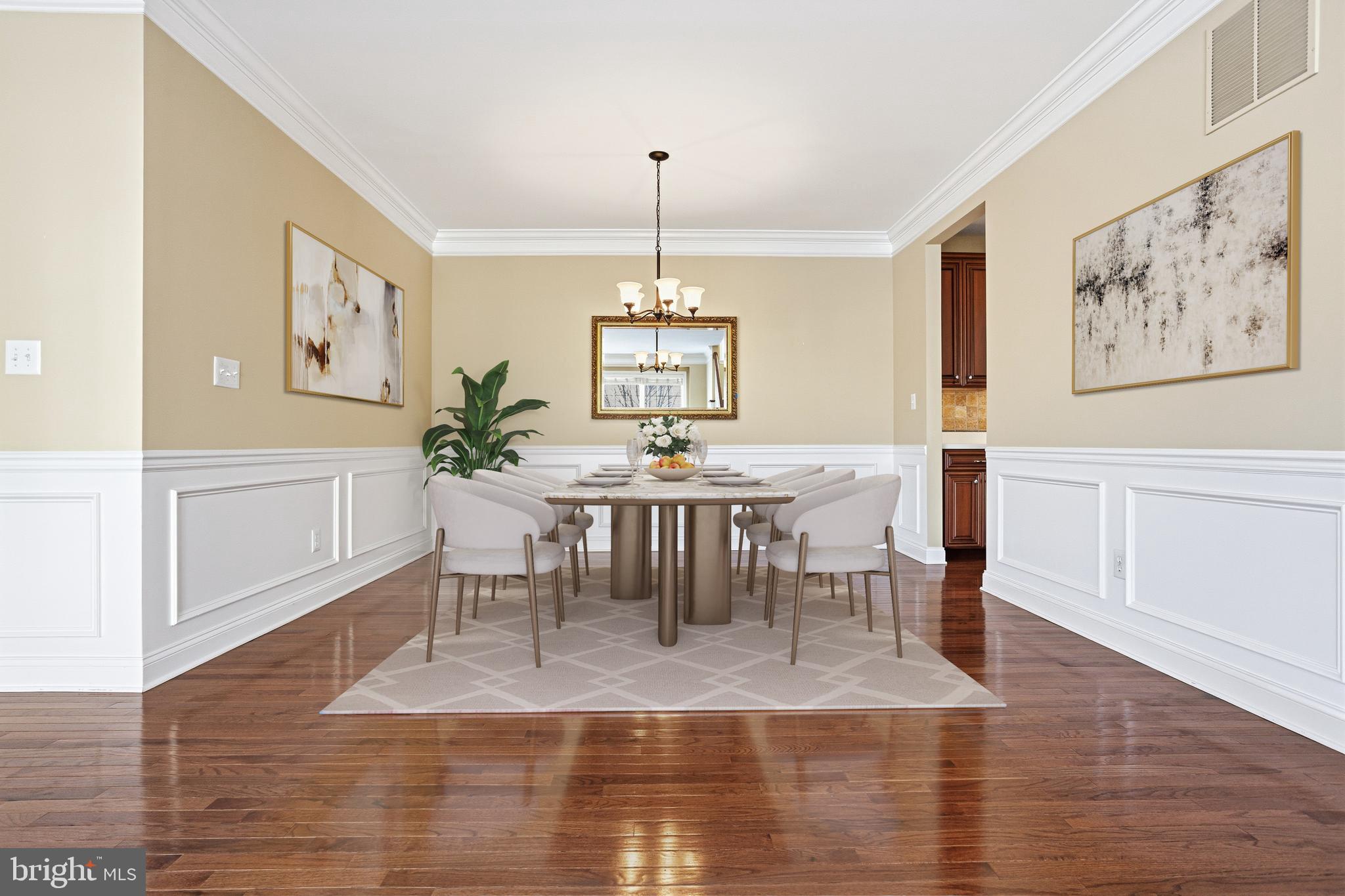 99 Longview Lane Newtown Square, PA 19073 - Photo 5 of 50 a dining room with wooden floor a chandelier a wooden table and chairs