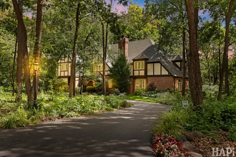 a backyard of a house with lots of green space