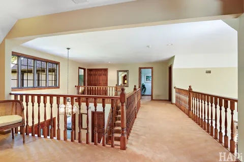 a view of an empty room and a window