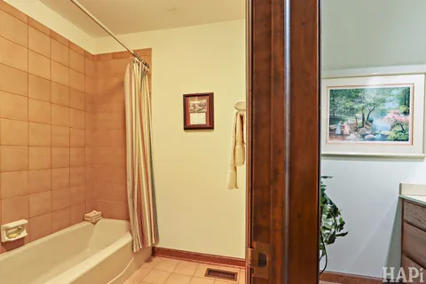 a view of a patio with a table chairs and backyard