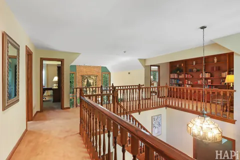 a wooden bench sitting next to a lake