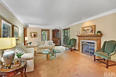 a living room with a couch and a large window