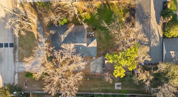 a sign that is sitting on a wooden floor