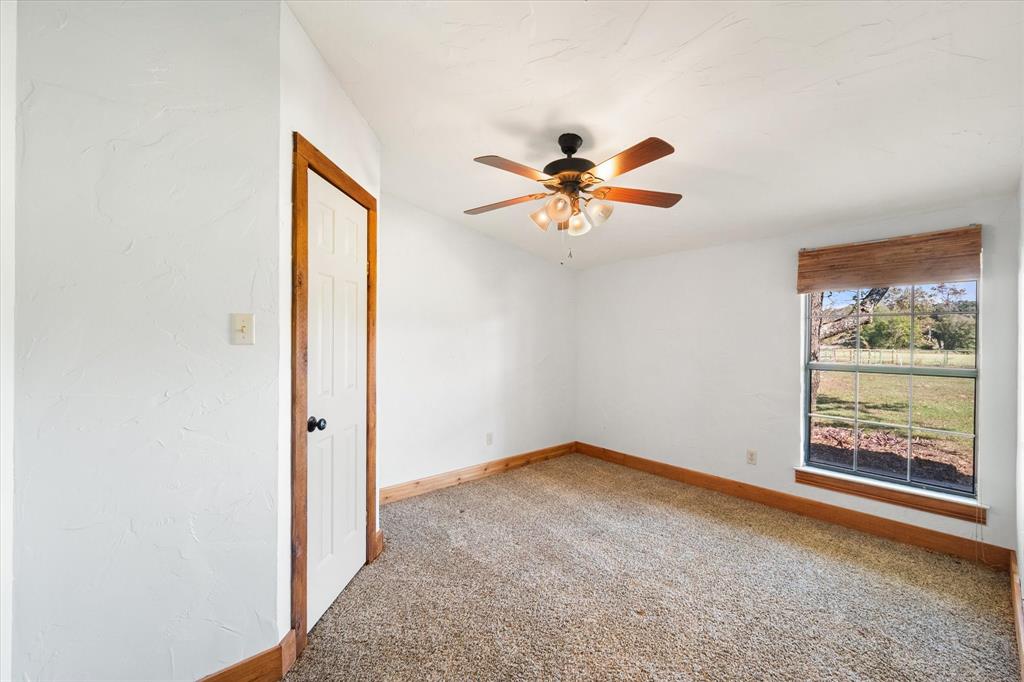 340 Farm To Market 27 Fairfield, TX 75840 - Photo 14 of 40 an empty room with a window