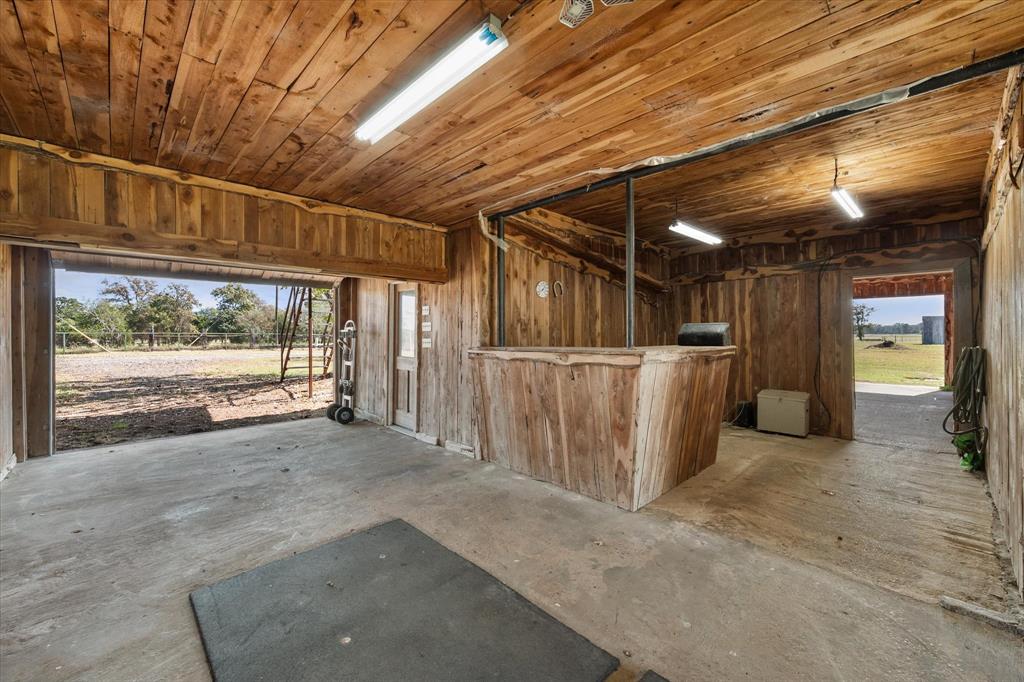 340 Farm To Market 27 Fairfield, TX 75840 - Photo 19 of 40 a view of a room with wooden walls