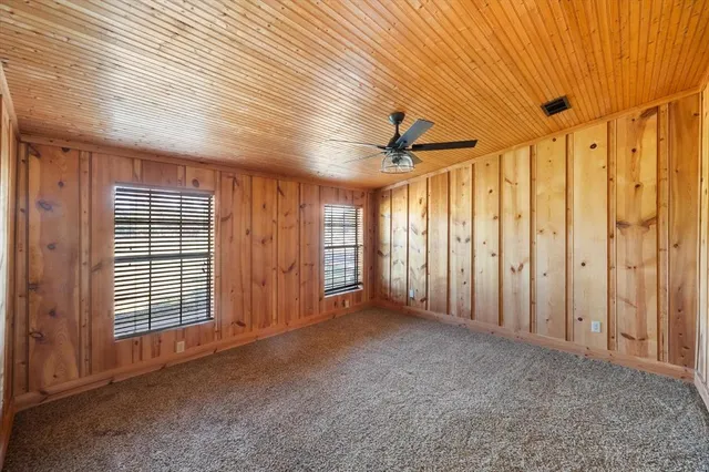 a view of a hallway with a chandelier
