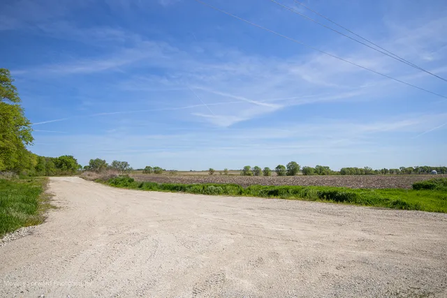 a view of a road with an ocean view