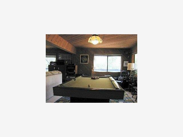 425 Martin Road Santa Cruz, CA 95060 - Photo 6 of 6 a living room with furniture and a flat screen tv