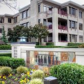 a view of a building with a garden