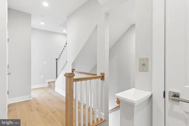 a spacious bedroom with a bed and a couch