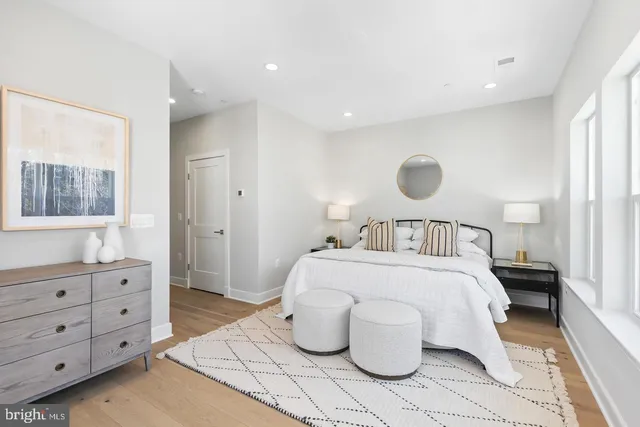 a bathroom with a double vanity sink and mirror