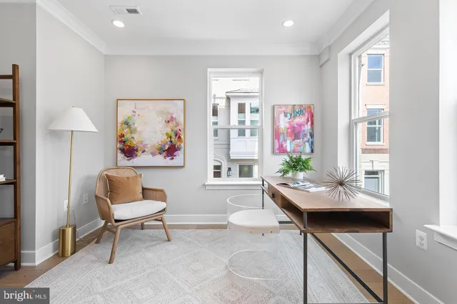 a view of entryway with wooden floor and stairs