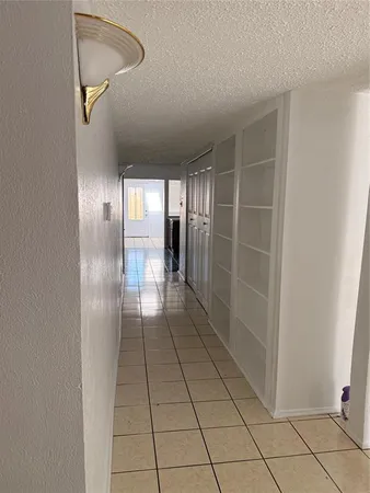 a bathroom with a toilet and a bathtub