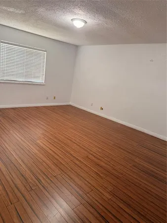 a bathroom with a shower and a toilet