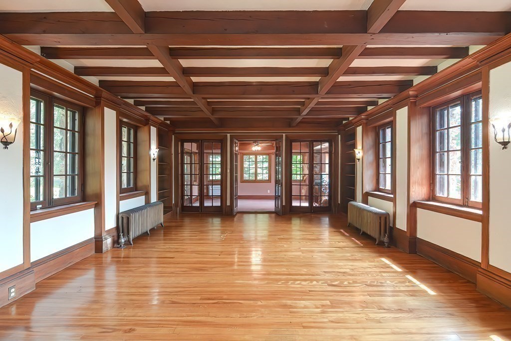 1 Summit Road Franklin, MA 02038 - Photo 14 of 42 a view of an empty room with wooden floor and a window