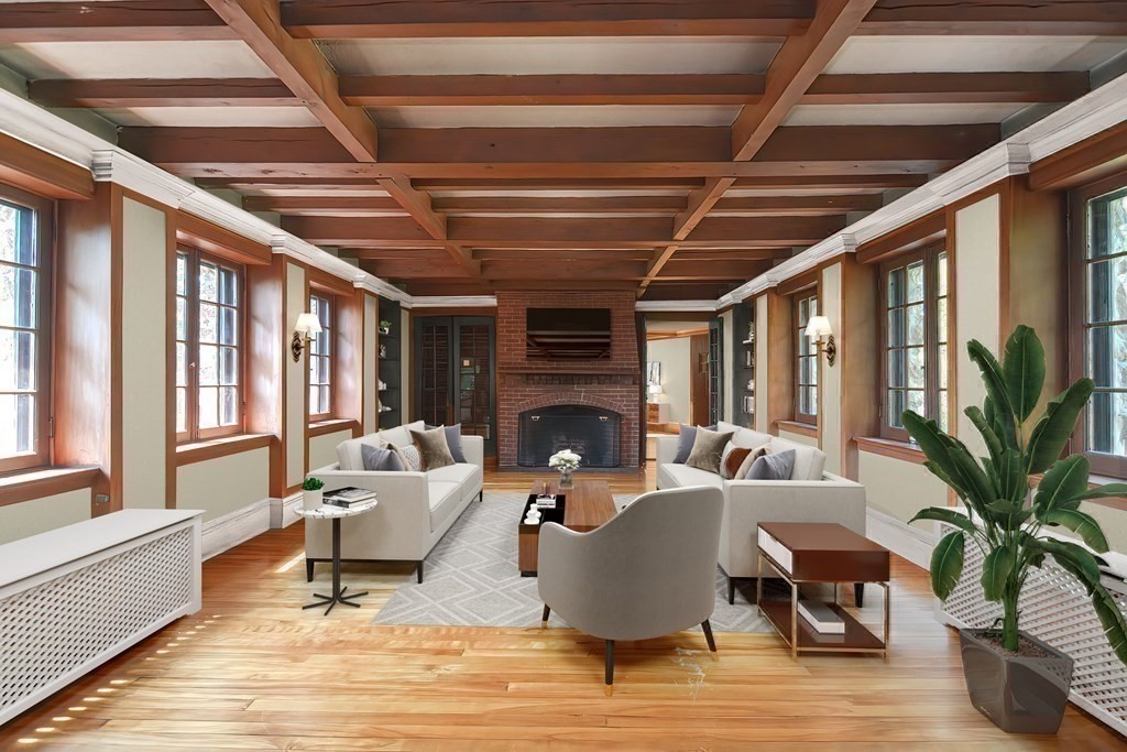 1 Summit Road Franklin, MA 02038 - Photo 18 of 42 a living room with patio furniture and a fireplace