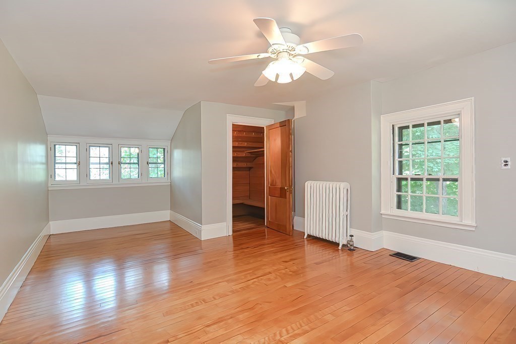 1 Summit Road Franklin, MA 02038 - Photo 25 of 42 a view of an empty room with wooden floor and a window