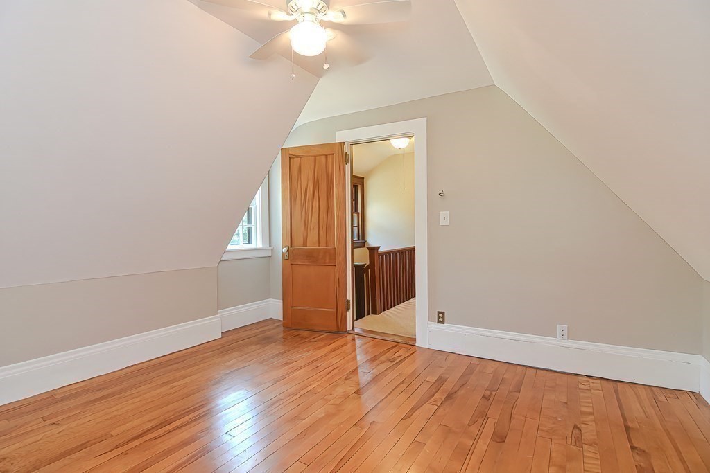 1 Summit Road Franklin, MA 02038 - Photo 27 of 42 an empty room with wooden floor and windows