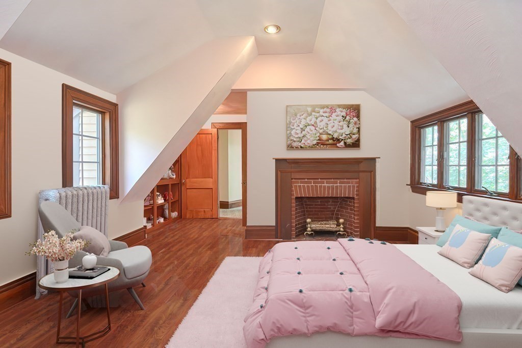1 Summit Road Franklin, MA 02038 - Photo 28 of 42 a bedroom with a bed and a fireplace