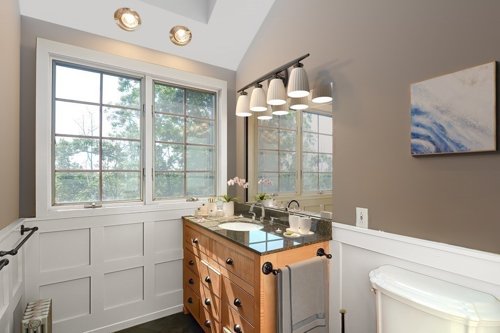 1 Summit Road Franklin, MA 02038 - Photo 30 of 42 a kitchen with a sink stove and cabinets