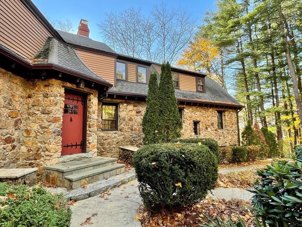 1 Summit Road Franklin, MA 02038 - Photo 3 of 42 a front view of a house with a yard