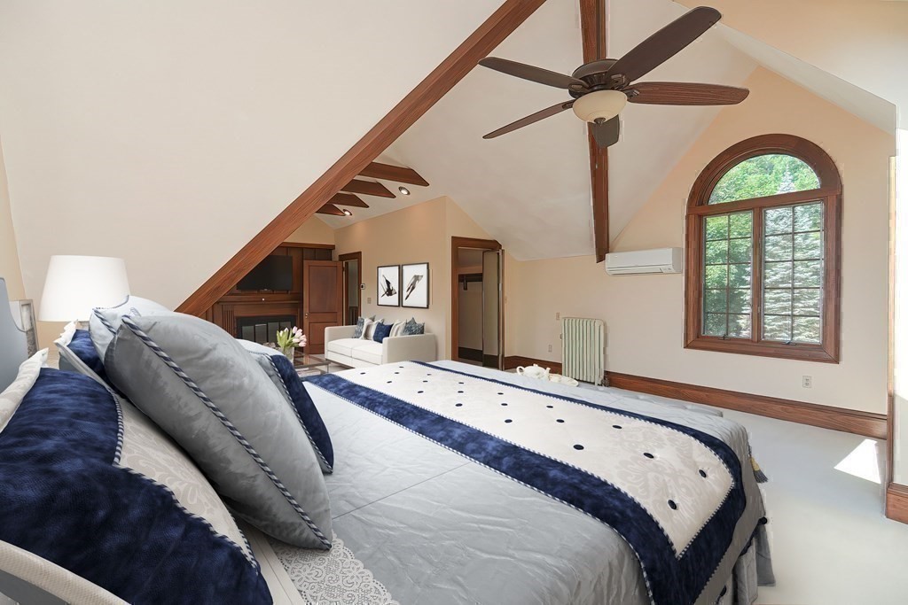 1 Summit Road Franklin, MA 02038 - Photo 34 of 42 a living room with a bed furniture and a window